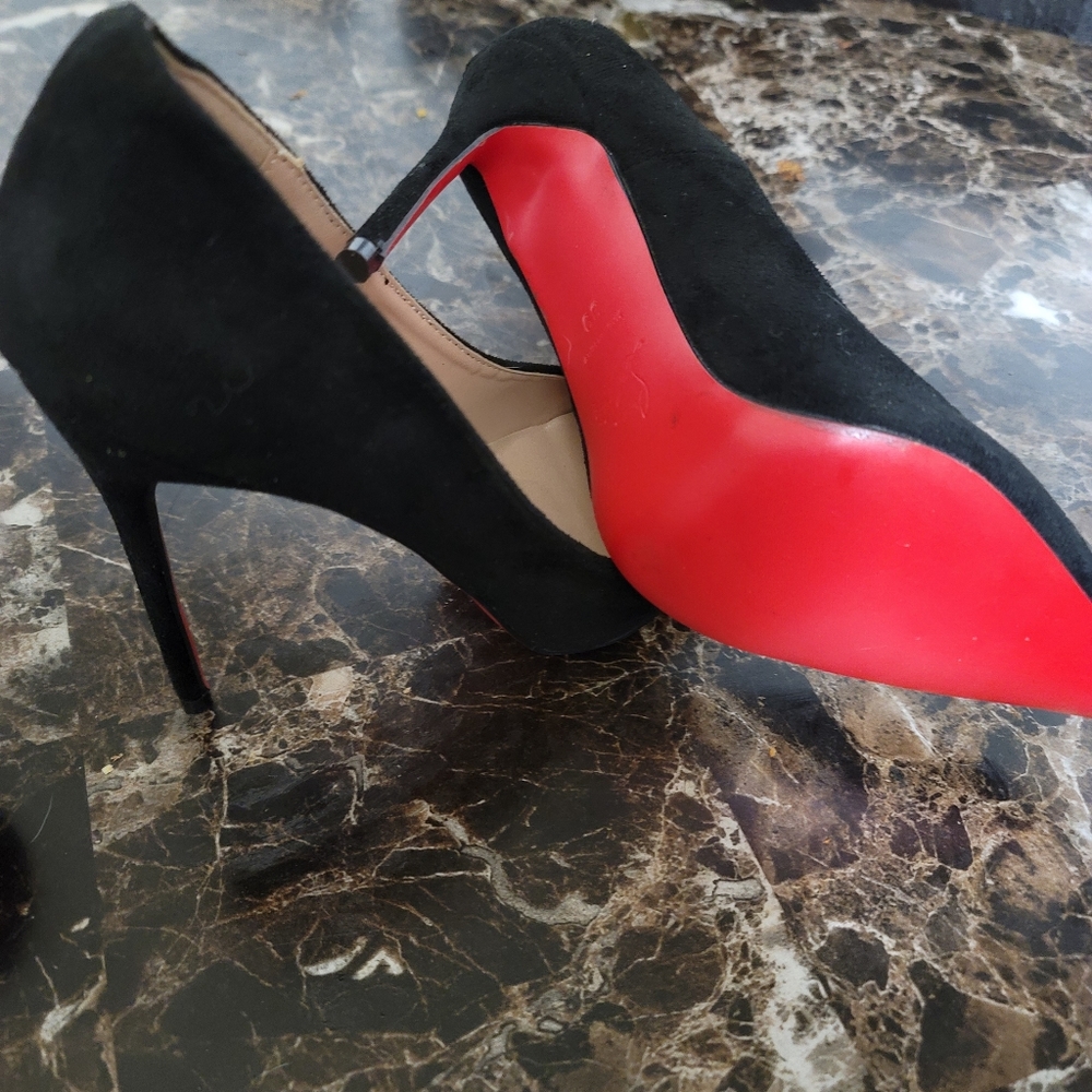 Christian Louboutin red Bottoms